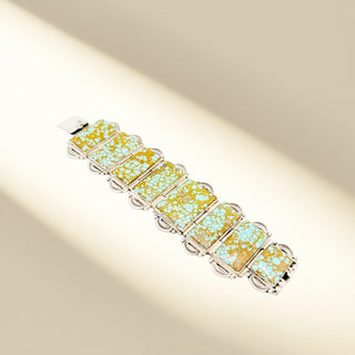 Bracelet with blue and yellow floral pattern on a beige background
