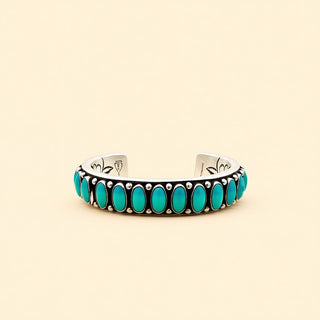 Turquoise beaded bracelet on a beige background