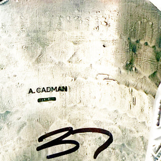 silver jewelry with 'A. Cadman' engraving