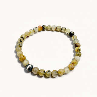 Beaded bracelet with multicolored beads on a white background