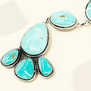 Turquoise stone on a beige background