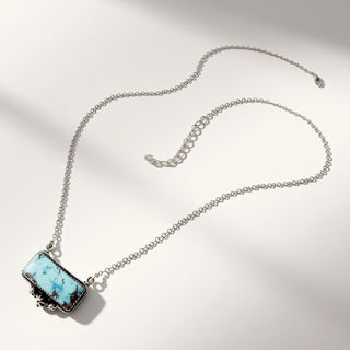 Turquoise necklace on a beige background