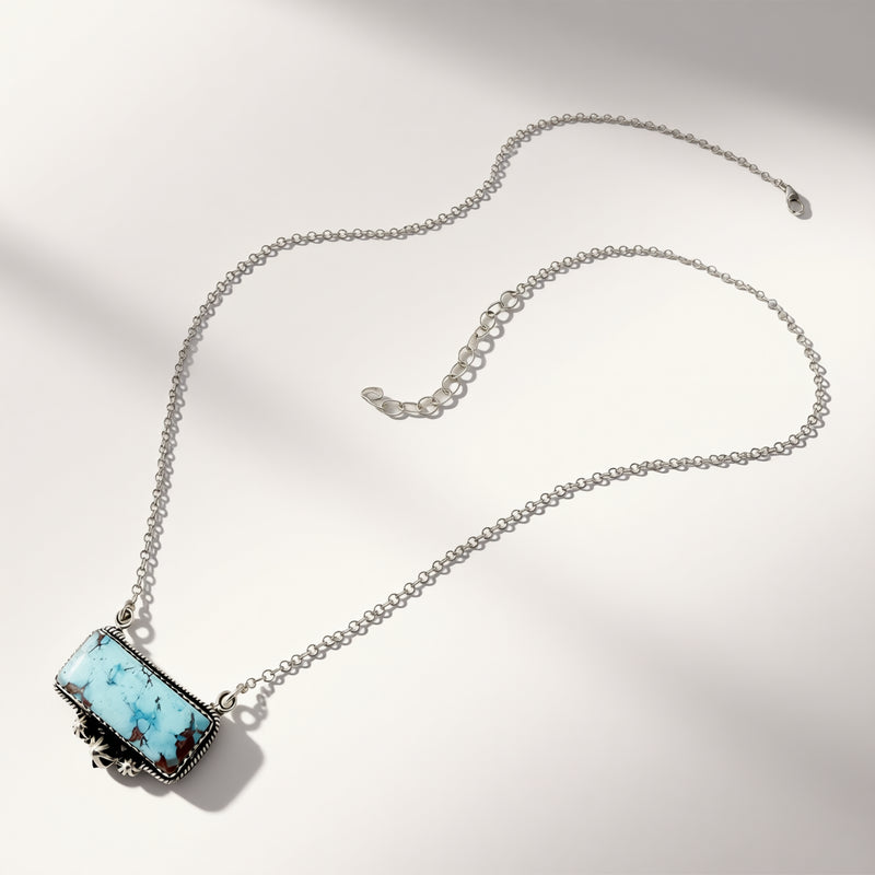Turquoise necklace on a beige background