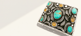 turquoise jewelry on a beige background