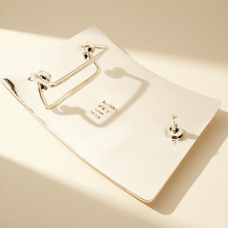 Belt buckle stamp on a beige background