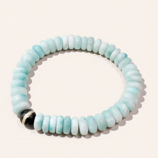 Light blue beaded bracelet on a white background