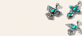 Three turquoise pendants on a beige background