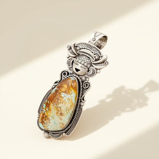 Silver brown pendant on a beige background