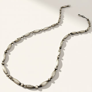 Silver necklace on a white background