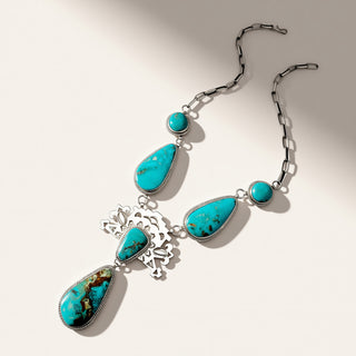 turquoise necklace on a beige background