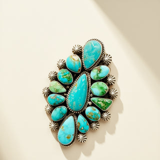 Turquoise ring on a beige background