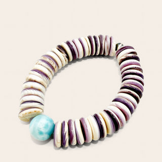 Bracelet with striped beads on a light background
